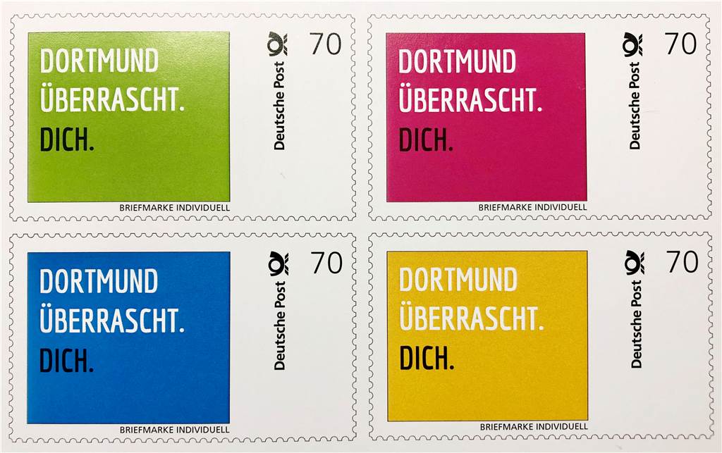 Neue Auflage des Buches „Eine Stadt. Viele Stärken.“ Die „Dortmund überrascht.Dich“-Briefmarke.