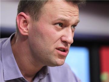 Die Fortschrittspartei des Bloggers Alexej Nawalny und die Gruppe RPR-Parnas des ermordeten Ex-Regierungschefs wollen 2016 gemeinsam antreten. Foto: Maxim Shipenkov/Archiv