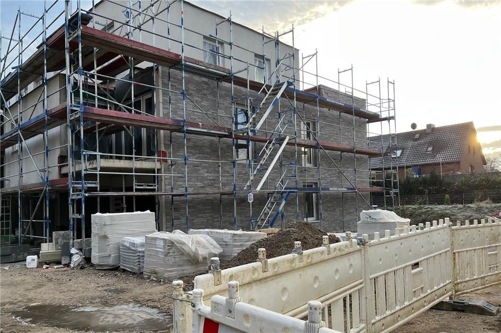 Neue Eigentumswohnungen kurz vor Vollendung: Das bieten und kosten sie Blick auf ein im Bau befindliches Mehrfamilienhaus am Dietrich-Bonhoeffer-Weg in Herten.