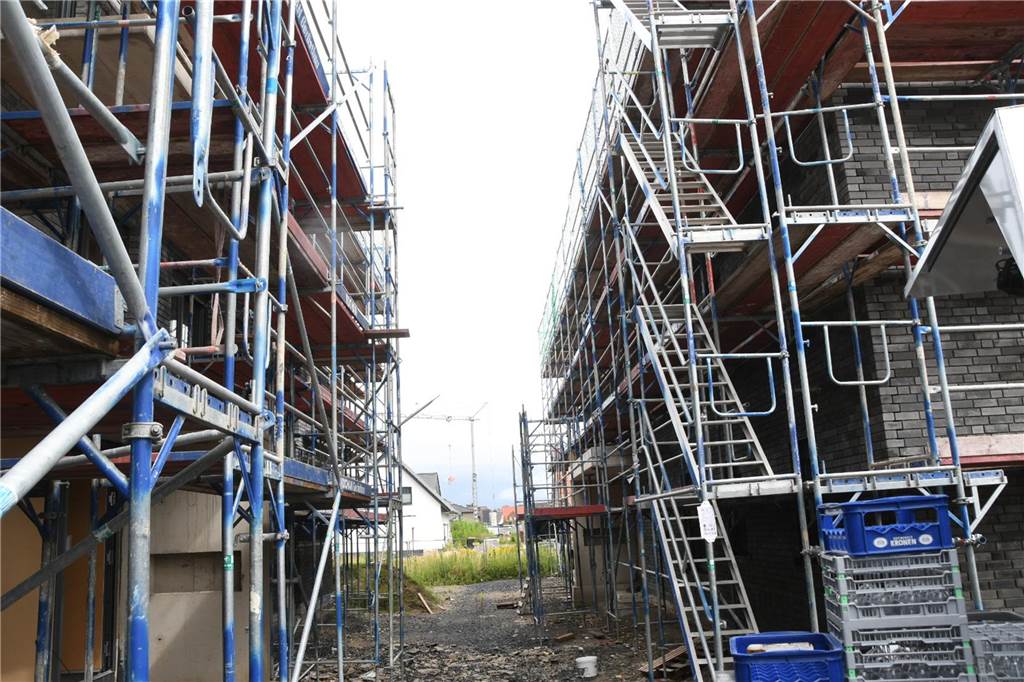 Grundstückswerte und Verkäufe: So haben sich die Zahlen entwickelt Die Häuser im Rosenquartier fügen sich in das Neubaugebiet Olfener Heide ein. Sie prägen das Entrée zum Neubaugebiet.