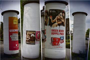 Litfaßsäulen in Dorsten - mal mit Werbung beklebt, mal nicht behängt.