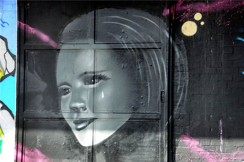 Stadt sperrt Graffiti-Halle am Bahnhof: Betreten verboten Die Mona-Lisa von Schwerte: Richtige Graffiti-Kunst ist auf dem großen Schiebetor des früheren Güterschuppens an der Margot-Röttger-Rath-Straße entstanden.