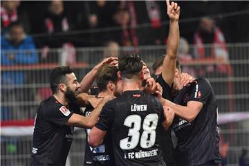 Die Nürnberger feiern den 1:0-Sieg bei Union Berlin. Foto: Maurizio Gambarini
