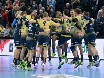 Die Rhein-Neckar Löwen gewinnen in Kiel mit 29:26. Foto: Axel Heimken