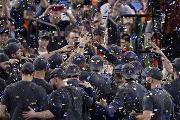 Die Spieler der Houston Astros feiern den Einzug in die MLB-Finalserie. Foto: Charlie Riedel