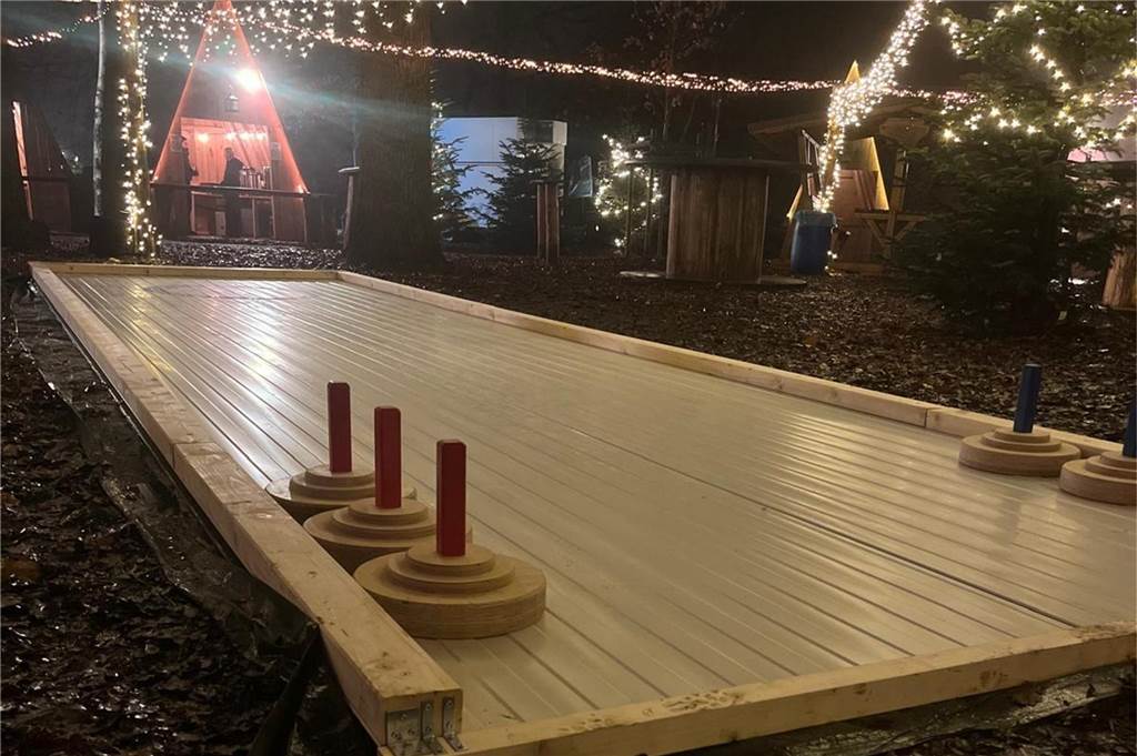 Heeker Winterzauber: Stimmungsvolle Adventszeit im Pastors Busch Eine Stockschießbahn auf einem Weihnachtsmarkt