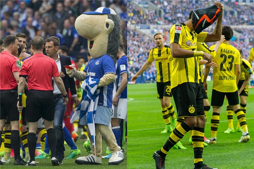 Die zwei Hauptdarsteller des 172. Revierderbys: Schalke-Maskottchen Erwi (l.) und Dortmunds Maskenmann Pierre-Emerick Aubameyang.