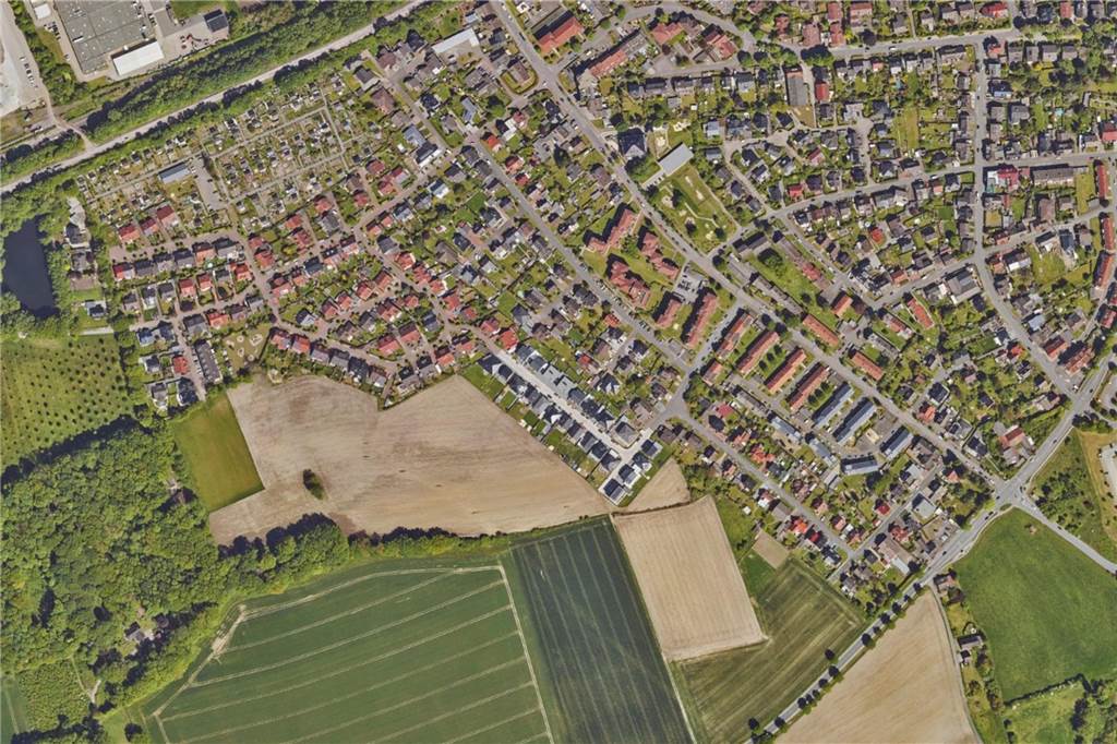 Dieses Foto datiert der RVR exakt auf das Jahr 2020. Wer genau hinschaut, erkennt weitere Wohnbebauung, die quasi nahtlos an den Bestand angesetzt wurde. Dabei handelt es sich um das Baugebiet Bellingholz-Ost.