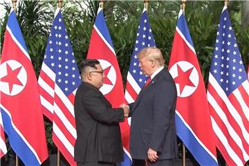 Donald Trump und Kim Jong Un bei ihrem ersten Treffen. Foto: Host Broadcaster Mediacorp Pte Ltd Pool
