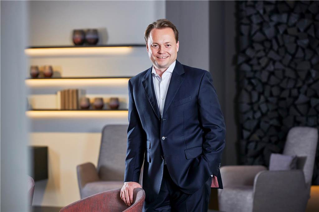 Hülsta: Amtsgericht hebt Insolvenzverfahren auf Dr. Thomas Knecht schaut lächelnd in die Kamera