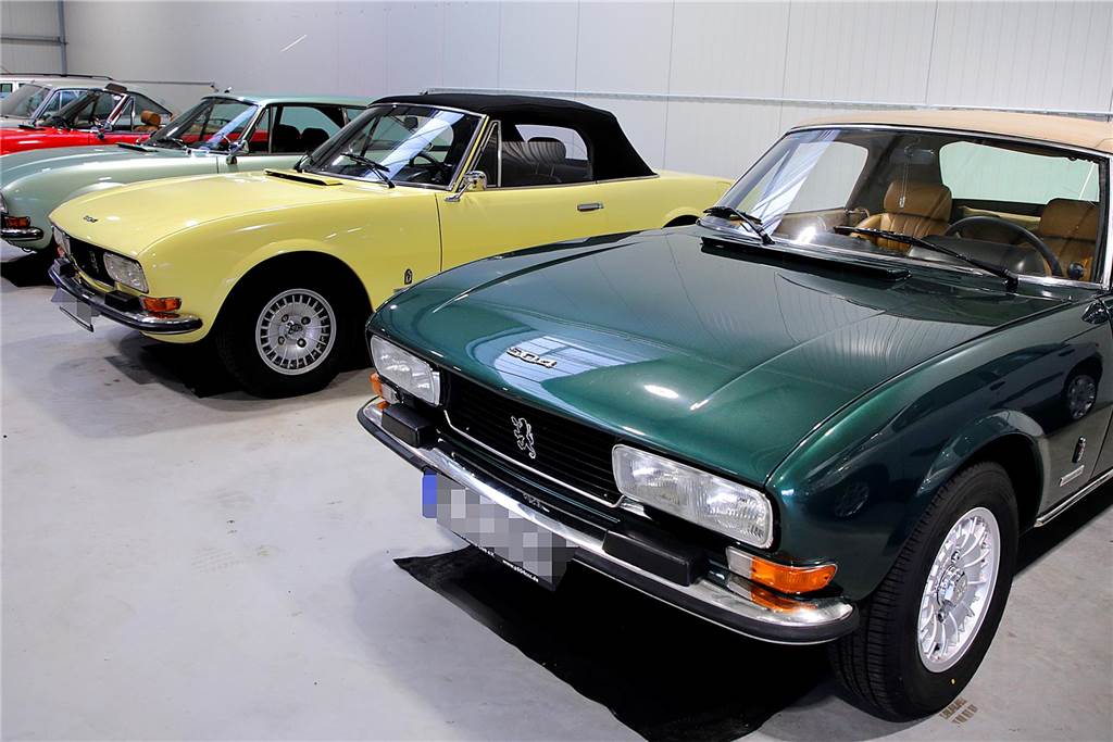 Cruisen im Cabrio: Christian Hölpers Leidenschaft gehört dem Peugeot 504 Vier Peugeot 504 stehen in einer Halle