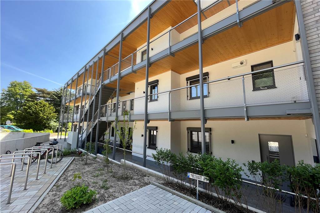 Tag der Architektur: Klimaschutzsiedlung wird zum Vorzeigeprojekt Dreigeschossig und mit Laubengängen verbunden sind die vier Gebäude des Wohnkomplexes.