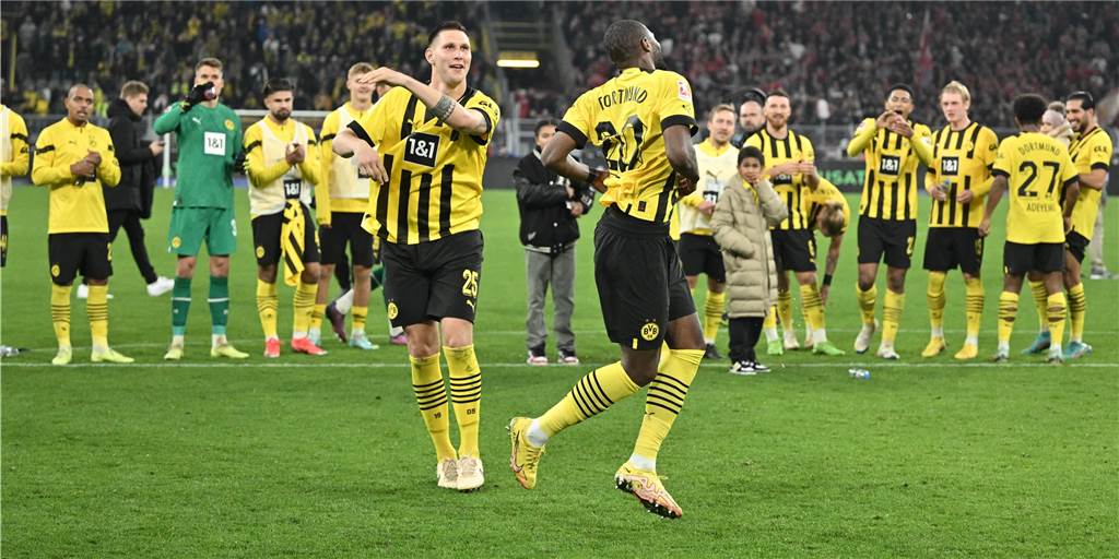 BVB-Eskalation in der Nachspielzeit: Modeste vom Pechvogel zum Helden Niklas Süle und Anthony Modeste feiern vor der Südtribüne.