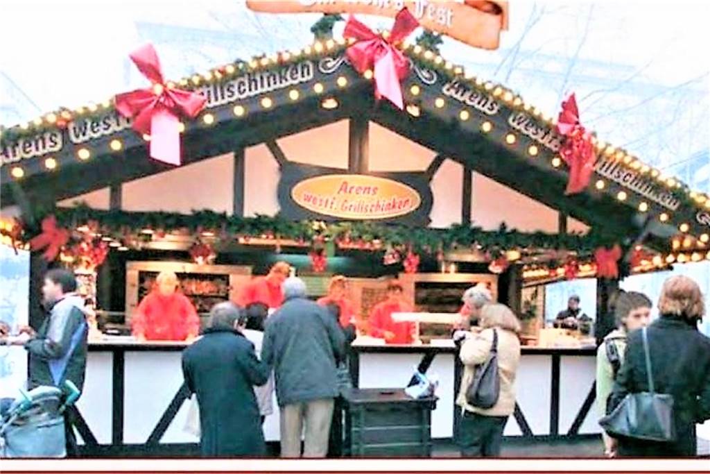 Auf Lieferclaus folgt Schinkenclaus: Arens‘ Weihnachtsmarkt wächst Ein Bild aus besseren Zeiten: der stets dicht umlagerte Grillschinkenwagen auf dem Weihnachtsmarkt.