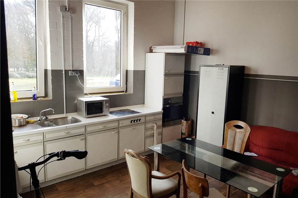 Zentrale Flüchtlingsunterkunft geplant: „Müssen Versäumnisse aufholen" Ein Blick in die Flüchtlingsunterkunft in der Bült. Bisher setzte die Gemeinde Heek auf auf eine dezentrale Unterbringung an zahlreichen Standorten.