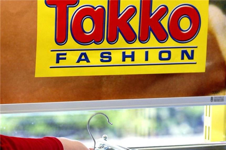 Bericht: Textildiscounter Takko soll an die Börse Eine Filiale des Mode-Discounters Takko. Foto: Roland Weihrauch/Archiv