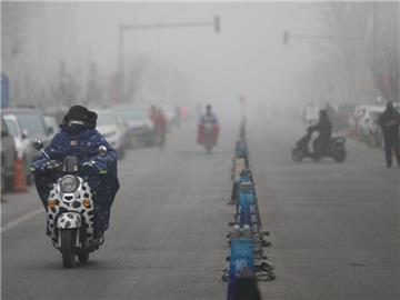 Eine Smog-Glocke breitet sich über Peking aus. Foto: Wu Hong