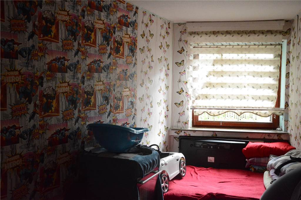 Familie geht über alles, Platz spielt keine Rolle: Aus dem Leben von Zuwanderern Eines der Kinderzimmer in der Wohnung in der Langen Straße 107.