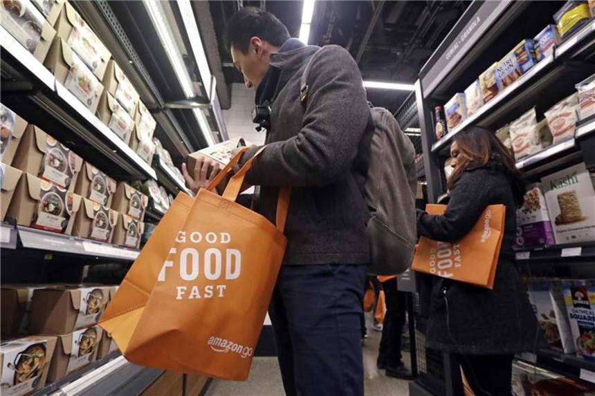Einkauf im Amazon Go Shop in Seattle. Foto: Elaine Thompson/AP