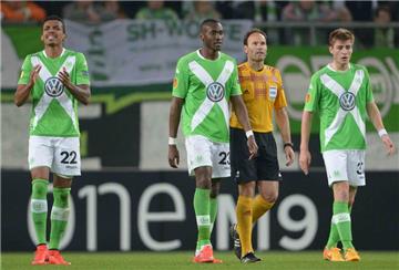 Enttäuschte Wolfsburger nach dem 1:4 gegen Neapel.