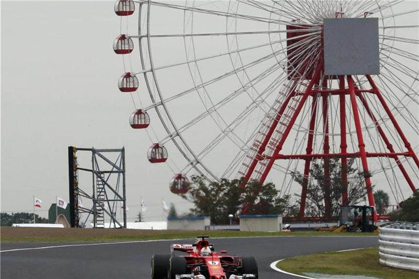 Vettel mit erster Japan-Bestzeit vor Hamilton Ferrari-Pilot Sebastian Vettel fuhr in Suzuka im Auftakttraining die beste Zeit. Foto: Toru Takahashi