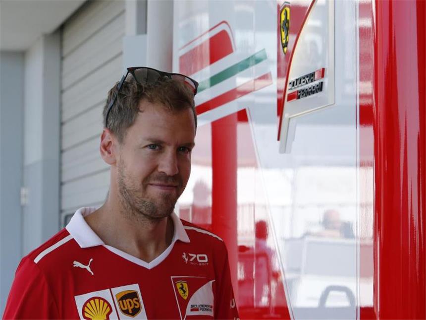 Kampf um WM-Titel: Vettels letzte Kraftanstrengung Ferrari-Pilot Sebastian Vettel glaubt weiter an seine WM-Chance. Foto: Toru Takahashi