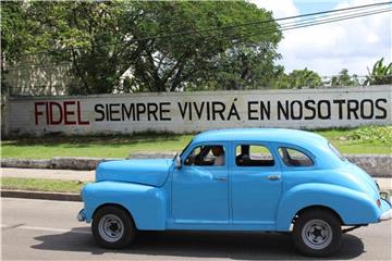„Fidel wird immer in uns weiterleben“ steht auf Spanisch auf einer Wand in Havanna geschrieben. Foto: Guillermo Nova