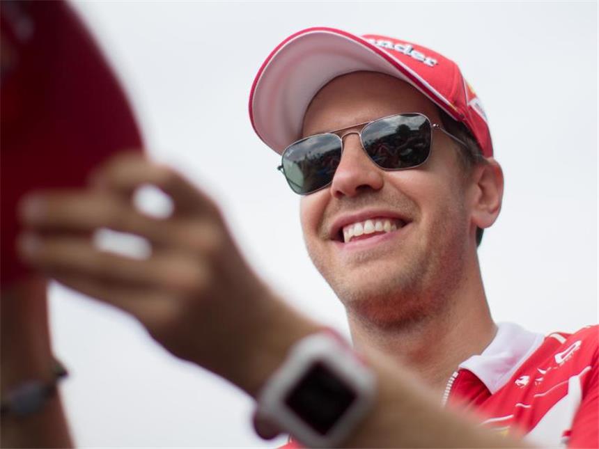 Sommerpause: Formel 1 lädt Akkus auf Formel-1-Star Sebastian Vettel freut sich auf die Sommerpause. Foto: Georg Hochmuth