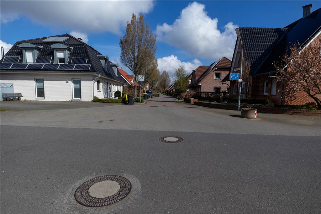 Anlieger über Endausbau: „Ich glaube nicht, dass jeder das Geld hat“ Für diese Stelle (Einfahrt Kämpensiedlung) soll noch eine Lösung gefunden werden, damit Autofahrer das Tempo an dieser Stelle reduzieren müssen.