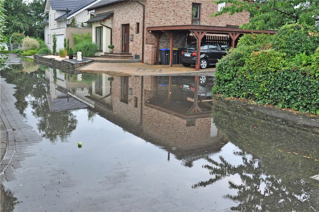 Starkregen und Trockenheit in Olfen: Stadt klärt über Gegenmaßnahmen auf Ganze Straßen waren 2013 überschwemmt.