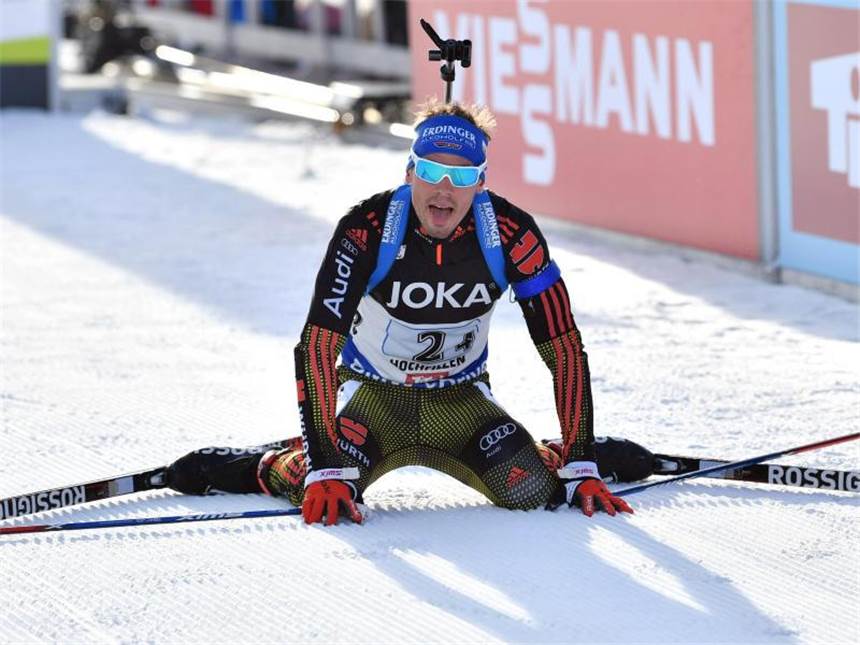 Deutsche Mixed-Staffel gewinnt Gold bei Biathlon-WM Geschafft, aber glücklich: Schlußläufer Simon Schempp im Ziel. Foto: Barbara Gindl