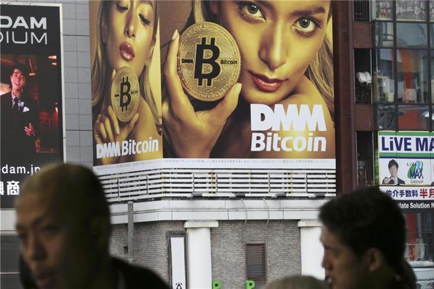 Goldman-Experte: Viele Digitalwährungen werden untergehen Große Werbung für Bitcoin in Japans Hauptstadt Tokio. Japan gilt als eine Hochburg für den Handel mit Digitalwährungen. Foto: Koji Sasahara