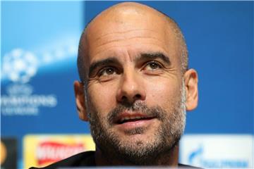 Guardiola hat seinen Vertrag beim englischen Fußballmeister Manchester City bis 2021 verlängert. Foto: Martin Rickett/PA Wire