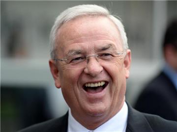 Gute Laune: Martin Winterkorn bleibt überrraschend Volkswagen-Konzernchef. Foto: Ralf Hirschberger