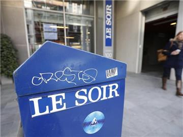 Haupteingang der belgischen Tageszeitung «Le Soir» in Brüssel. Erneut ist die Internetseite des «Soir» Opfer einer Cyber-Attacke geworden. Foto: Julien Warnand