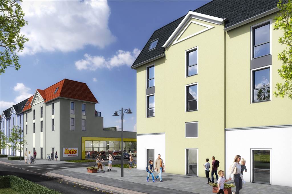 Neubauten für Kreisstraße in Selm: Das plant Ten Brinke nach dem Abriss Hinter diesem Gebäudeteil mit der gelben Fassade wird sich laut Planer der dm-Markt befinden. Die Zufahrt zu beiden Geschäften wird über die Lücke zwischen den Gebäuden an der Selmer Kreisstraße erfolgen.