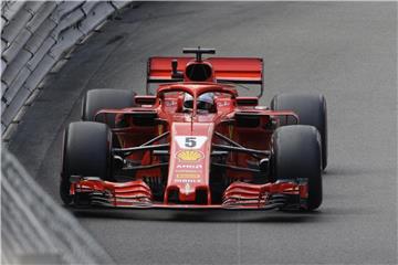 Hofft in seinem Ferrari auf die Pole: Sebastian Vettel. Foto: Luca Bruno/AP