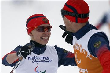 Holte in Pyeongchang Gold bei den sehbehinderten Biathletinnen: Michalina Lisowa (l) aus Russland. Foto: Valdrin Xhemaj