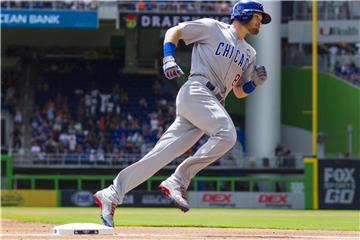 Ian Happ von den Chicago Cubs verwandelte den ersten Pitch der Saison gleich zu einem Homerun. Foto: Matias J. Ocner/Miami Herald/AP