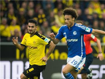 Ilkay Gündogan (l) und Leroy Sané - hier noch in der Bundesliga aktiv - spielen beide aktuell für Manchester City. Foto: Bernd Thissen