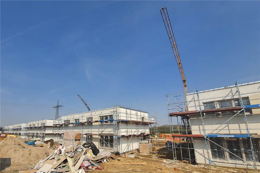 Mit Video: Schlüsselübergabe für Häuser im Wohnpark Emscherquelle naht Im ersten Bauabschnitt wurden zunächst zehn Flachdach-Doppelhäuser gebaut. Die bieten zehn Wohneinheiten und sollen im Laufe des Sommers bezugsfertig sein.