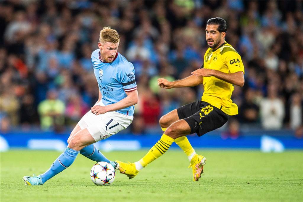BVB-Gerüchtecheck: Verlässt Emre Can Dortmund im Winter? Emre Can im Zweikampf mit Kevin de Bruyne.