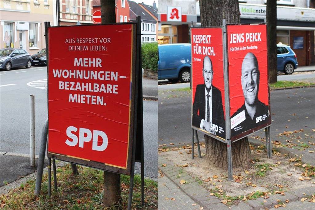 SPD nimmt Plakate von Bäumen – Regel-Interpretation in anderem Stadtteil In Marten interpretiert die SPD die Vorschriften der Sondernutzungserlaubnis unterschiedlich. Das Aufstellen eines "Sandwiches" an einem Baum in der Straße Sadelhof (links) ist mit Blick auf die Vorschriften zumindeIn Marten interpretiert die SPD die Vorschriften der Sondernutzungserlaubnis unterschiedlich. Das Aufstellen eines "Sandwiches" an einem Baum in der Straße Sadelhof (links) macst grenzwertig. In der Meile (rechts) erfüllt der Dreieckständer die Vorgaben der Wahlwerbung im Straßenraum.