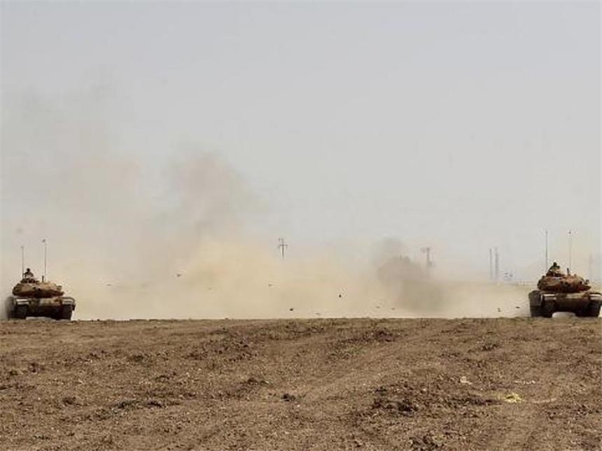 Iraks Kurden stimmen für Unabhängigkeit In Silopi, an der türkischen Grenze zum Irak, nehmen türkische und irakische Soldaten an einem Manöver teil. Foto: Pool Turkish Military