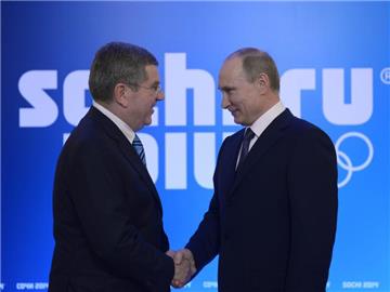 IOC-Präsident Thomas Bach (l) und Wladimir Putin in Sotschi. Foto: Alexei Nikolsky