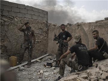 Irakische Soldaten nahe der Front in Mossul. Foto: Felipe Dana