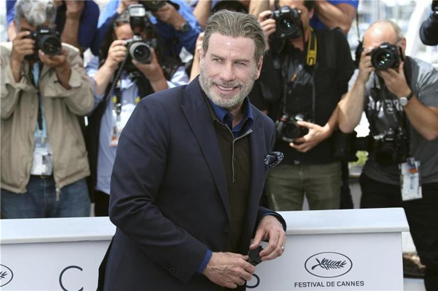 John Travolta: Tanzen im Club ist überflüssiger Stress John Travolta macht immer eine gute Figur. Alles eine Frage der Kleidung. Foto: Joel C Ryan/Invision/AP