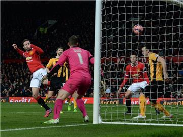 Juan Mata erzielt gegen Cambridge das 1:0. Foto: Nigel Roddis