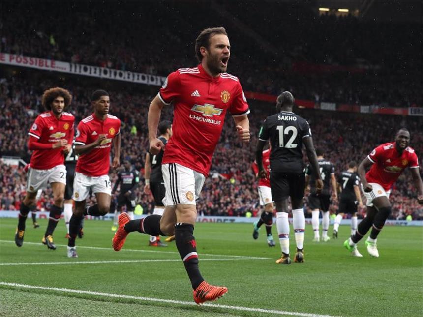 Man City gewinnt Topspiel - Man United und Spurs siegen klar Juan Mata von Manchester United freut sich über sein Tor. Foto: Martin Rickett