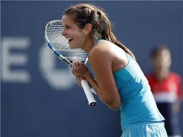 Julia Görges freut sich sichtlich über ihren Achtefinaleinzug bei den US Open. Foto: Adam Hunger